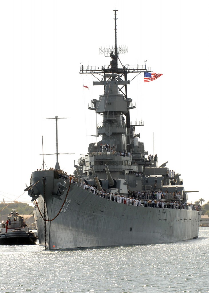 EX-USS Missouri (BB 63) returns to Ford Island after finishing scheduled repairs at Pearl Harbor Naval Shipyard.