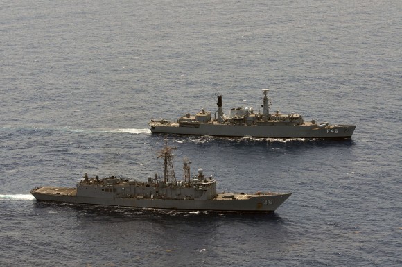 The Oliver Hazard Perry-class guided-missile frigate USS Underwood (FFG 36), foreground, conducts tactical maneuvers with the Brazilian frigate BNS Greenhalgh (F-46). Underwood and Greenhalgh are group sailing to Key West, Fla. for UNITAS Atlantic 53-2012.