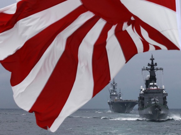 Japanese Maritime Self-Defense Force destroyer Kurama leads destroyer Hyuga during a naval fleet review at Sagami Bay, off Yokosuka, south of Tokyo