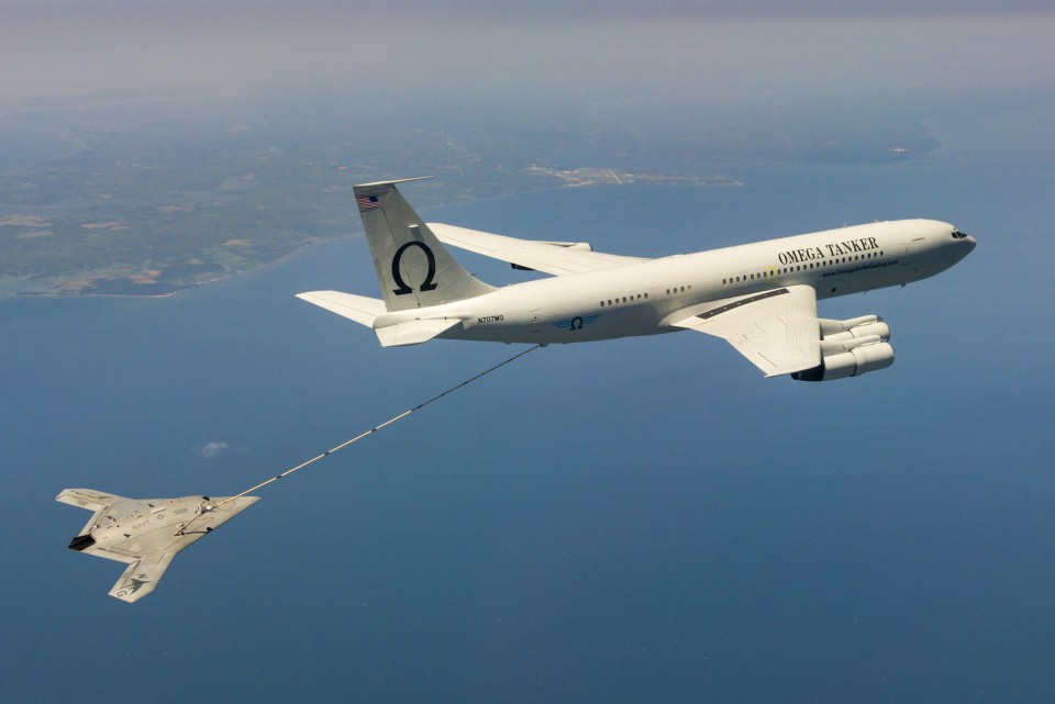 US Navy's X-47B, AV-2, Bureau # 168064, of Air Test and Evaluation Squadron Two Three (VX-23) successfully complete Air-to-Air Refueling (AAR) with the K-707 Omega Tanker over the Chesapeake Bay on 22 April 2015.  VX-23 is part of the Naval Test Wing Atla